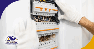Home inspector inspecting a circuit breaker panel with gloves during a home inspection