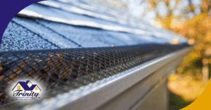 Close-up of a roof gutter guard on a house.