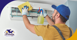 Technician cleaning mini split air conditioner